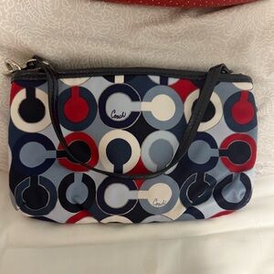 Coach Geometric Print Wristlet in Red, Blue, and White Horse and Carriage Emblem